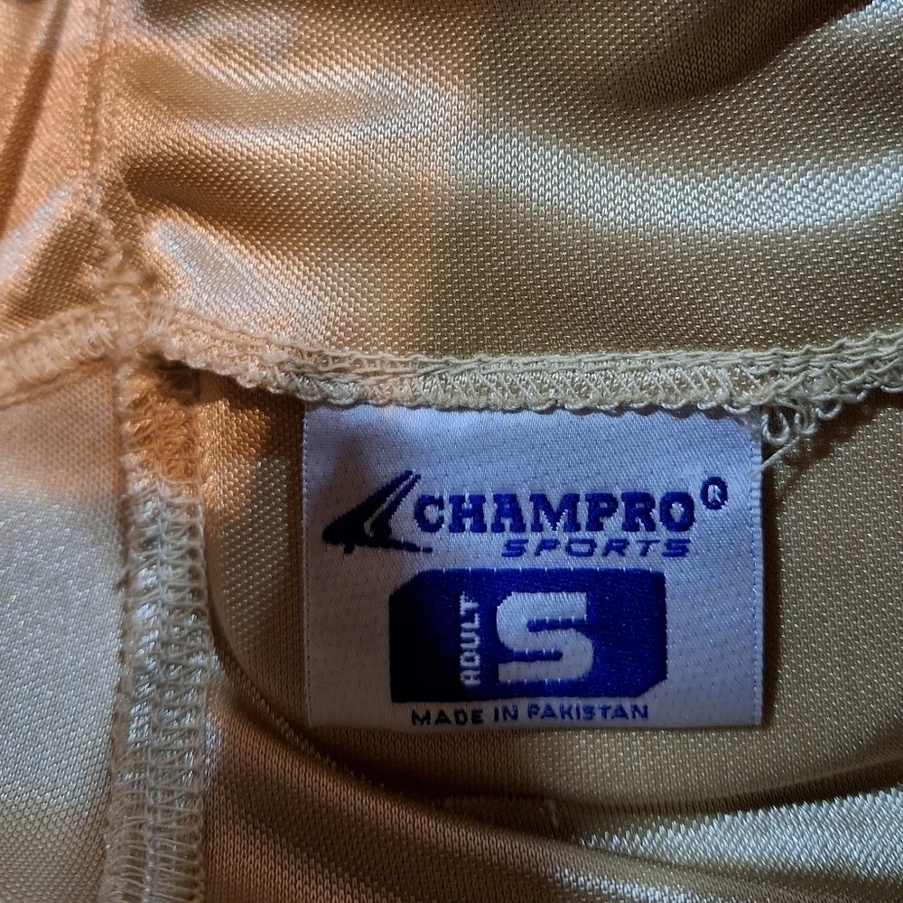 Champro Gold football pants in an adult small. EUC